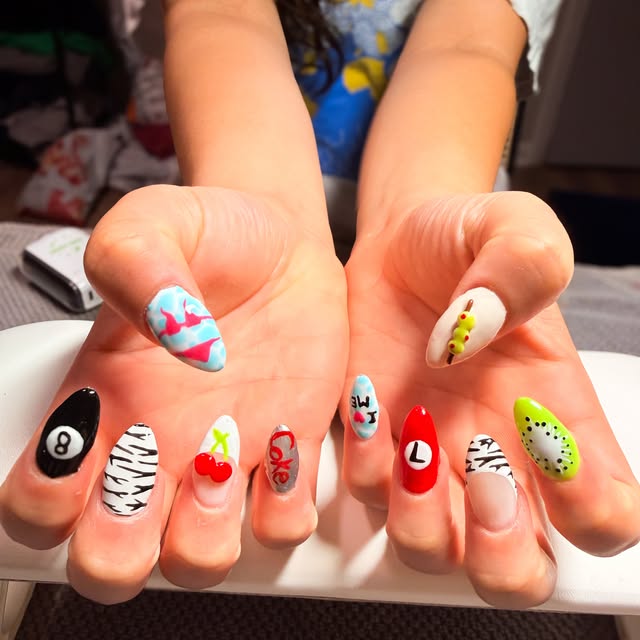 Mixed-pattern colorful nail art by Jessie